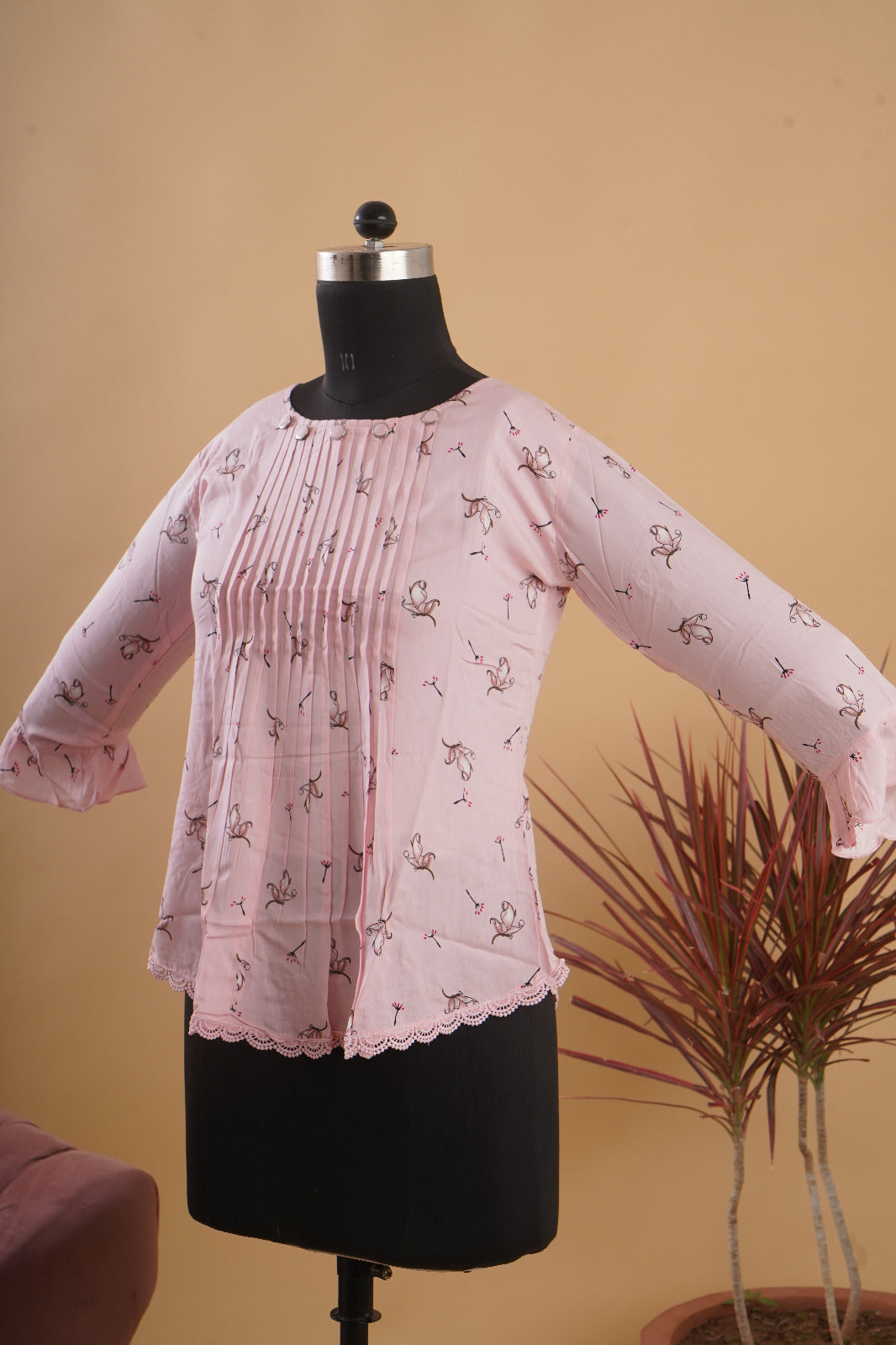 Copy of Baby pink rayon boat neck western top with trendy pattern and floral prints.