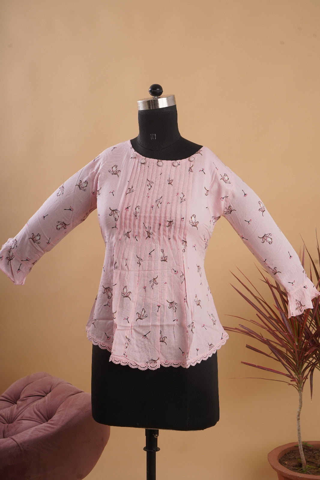 Copy of Baby pink rayon boat neck western top with trendy pattern and floral prints.
